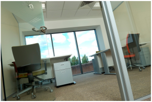 Open door into windowed office